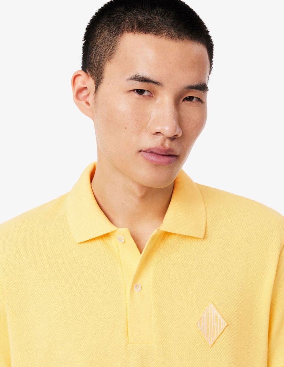 Polo Lacoste con Logo Insignia Amarillo Hombre - Imagen 5