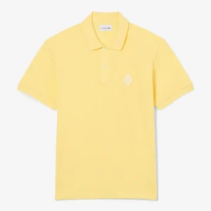 Polo Lacoste con Logo Insignia Amarillo Hombre