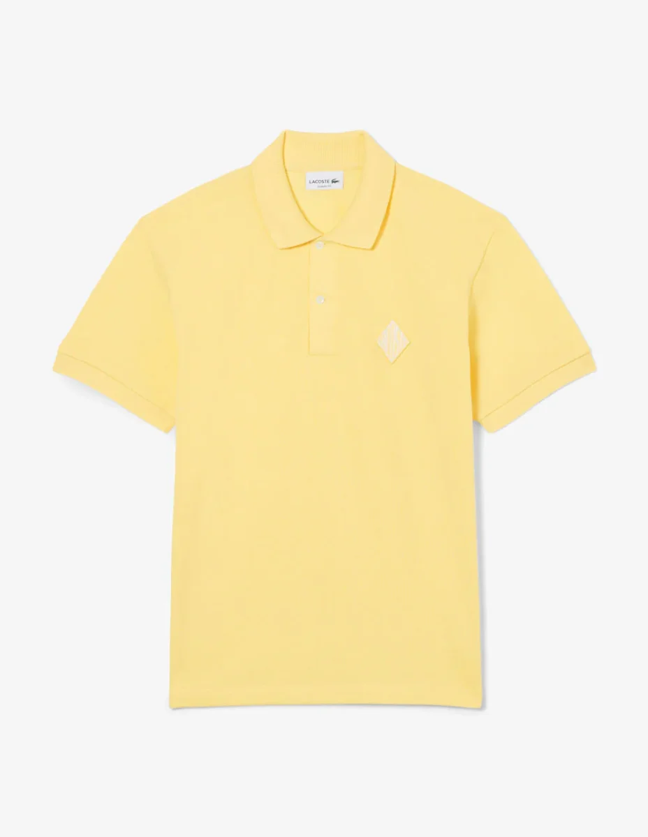 Polo Lacoste con Logo Insignia Amarillo Hombre